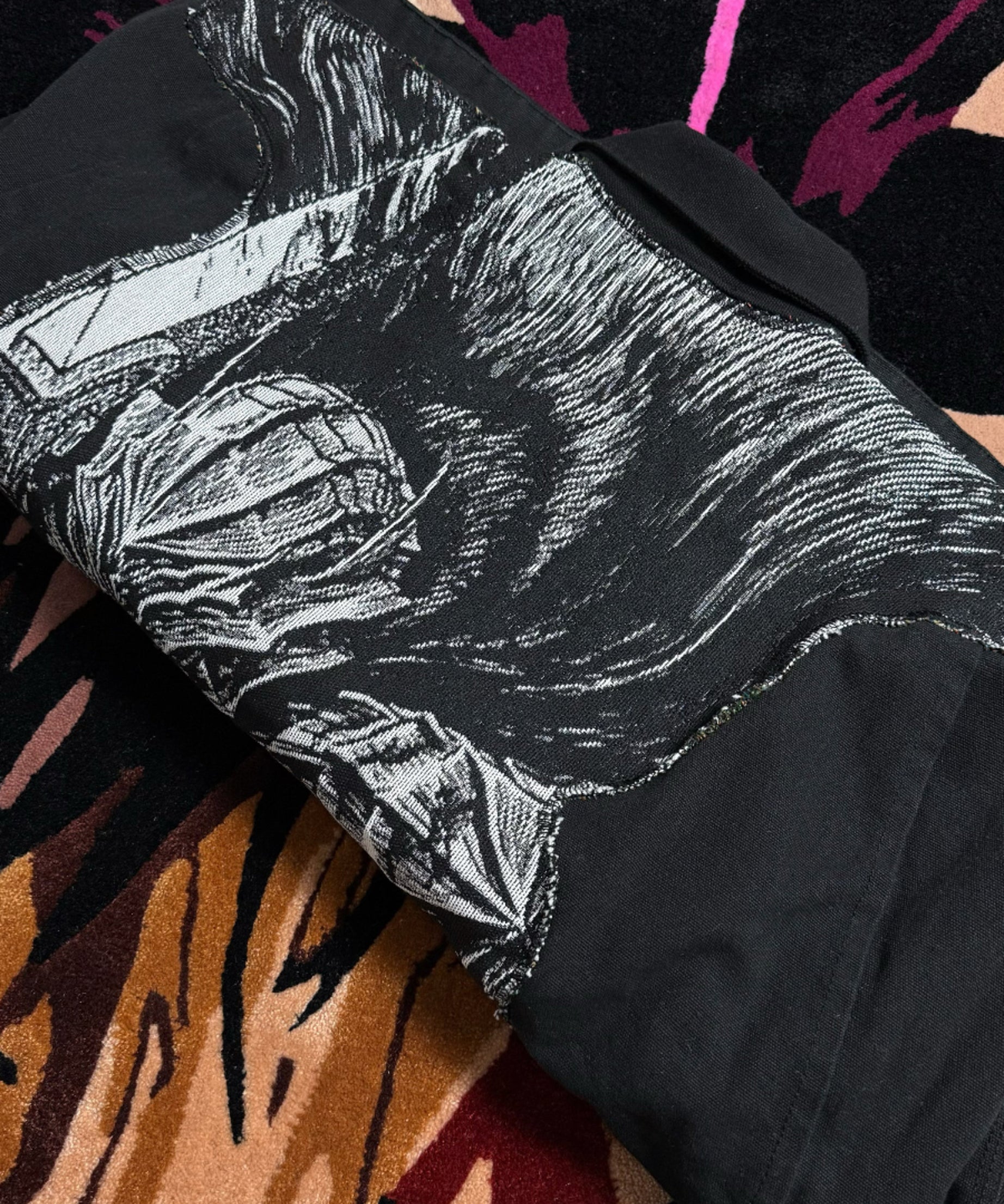 Guts Berserk anime merchandise design detail