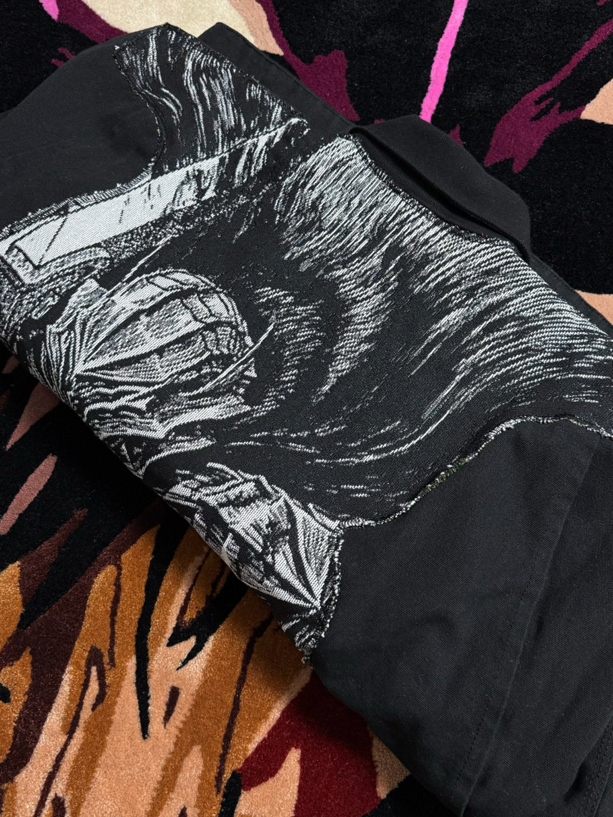 Guts Berserk anime merchandise design detail